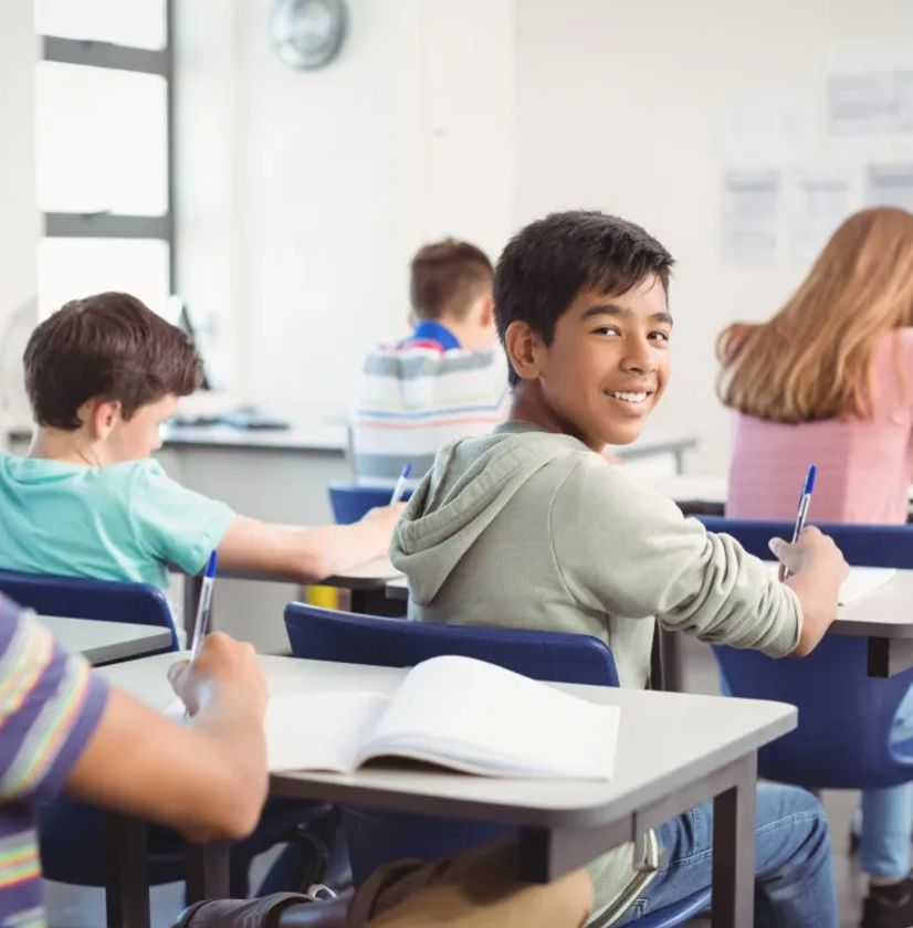 Happy students in classroom